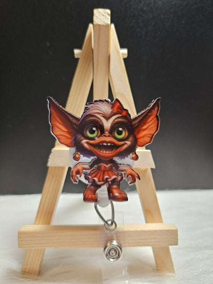 Girl Christmas Gremlin Badge Reel