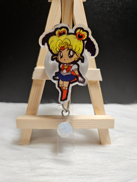 Sailor Moon girl badge reel with cartoon character charm and metal keyring