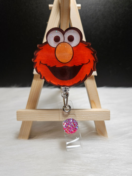 Elmo badge reel with glitter badge clip and retractable cord