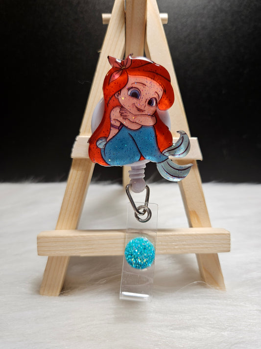 Mermaid badge reel with retractable clip, red-haired mermaid and blue tail charm