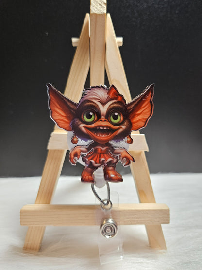 Girl Christmas Gremlin Badge Reel