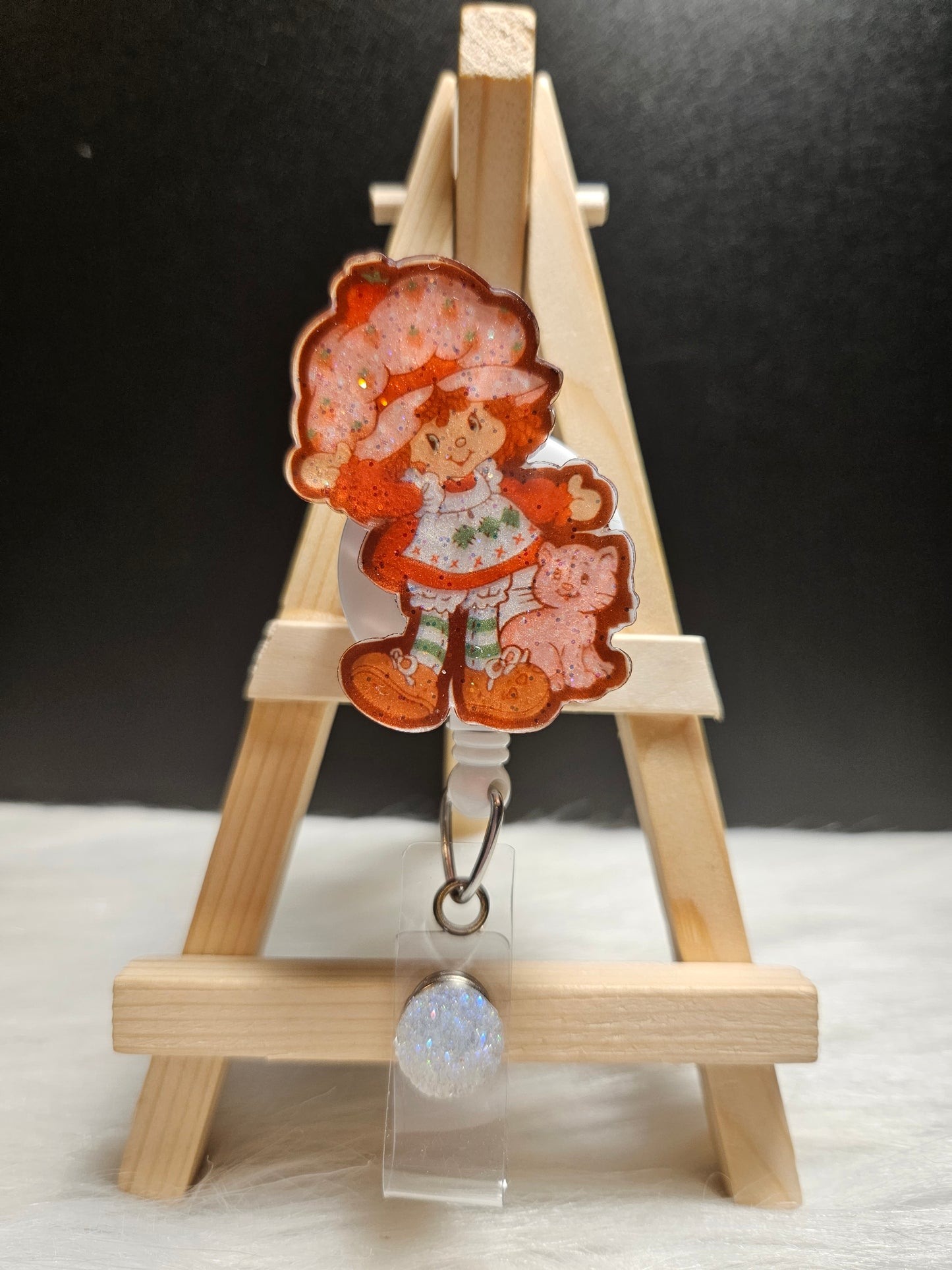 Strawberry girl character badge reel with retractable ID holder