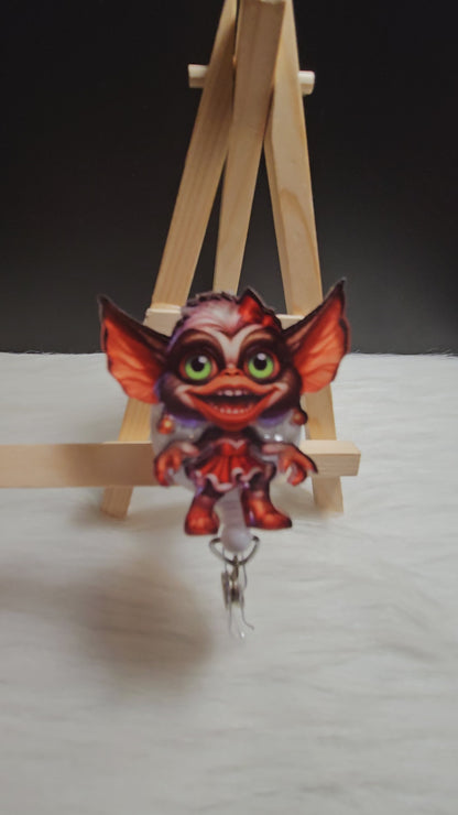 Girl Christmas Gremlin Badge Reel