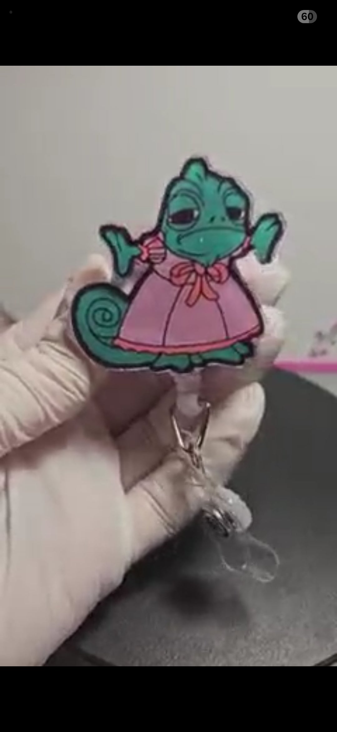 Pascal green chameleon badge reel from Disney Tangled
